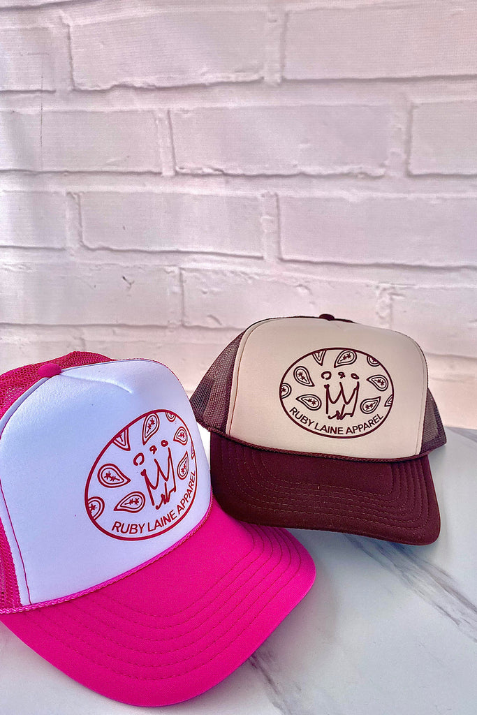 pink and brown trucker hats